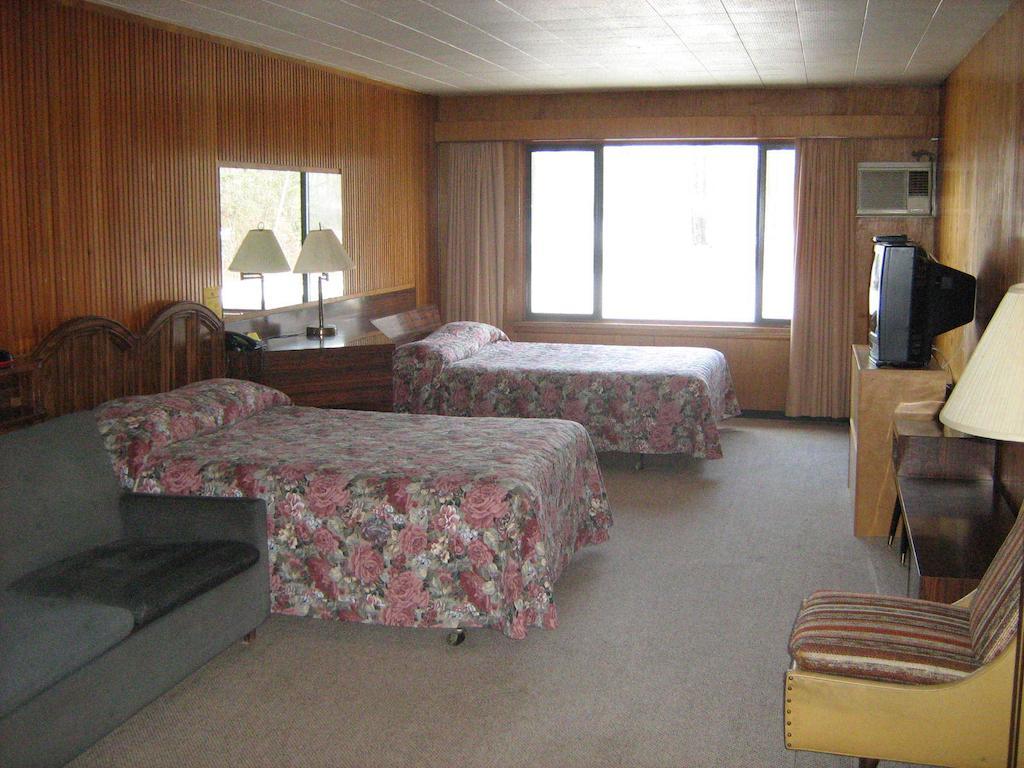 كويسنيل Airport Inn الغرفة الصورة